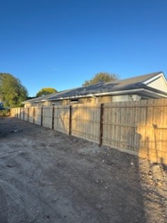 New treated pine paling fence on the same boundary